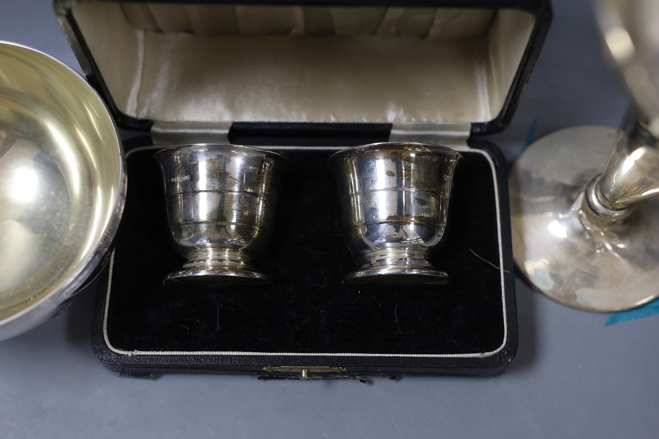 A modern silver sugar bowl, 11.2cm, 6oz a case pair of silver salts and a silver mounted trumpet vase.